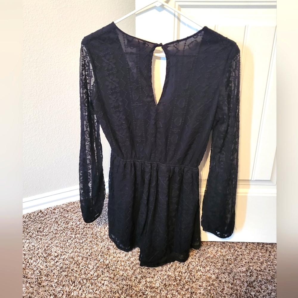 Black romper, shorts but long sleeves